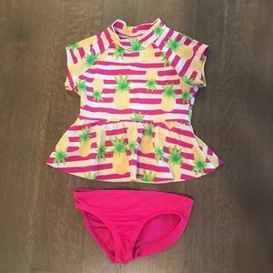 Little girl Lands’ End tankini rashguard